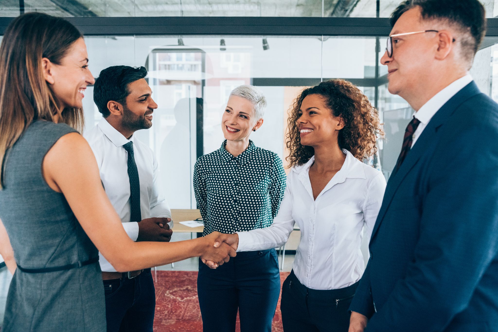 Image of people shaking hands representing a partnership