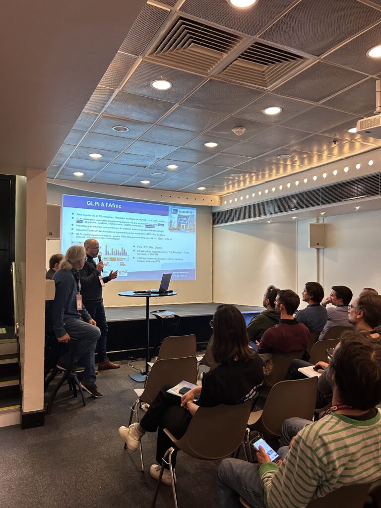 Photo illustrating the Afnic and GLPI conference for the GLPI Carbon plugin